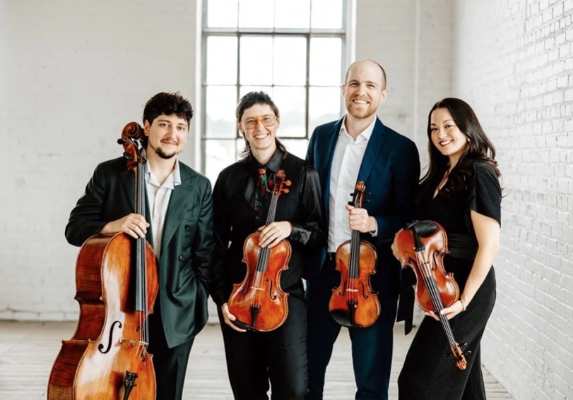 The Thalea String Quartet with their instruments